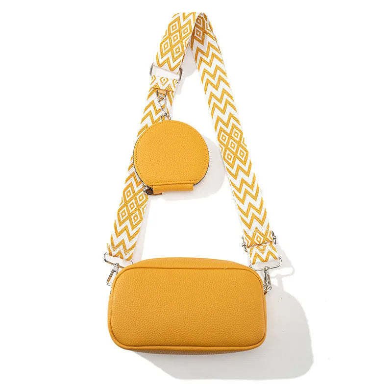 Soft black PU crossbody bag for women with a single shoulder strap and decorative sewing thread details.
