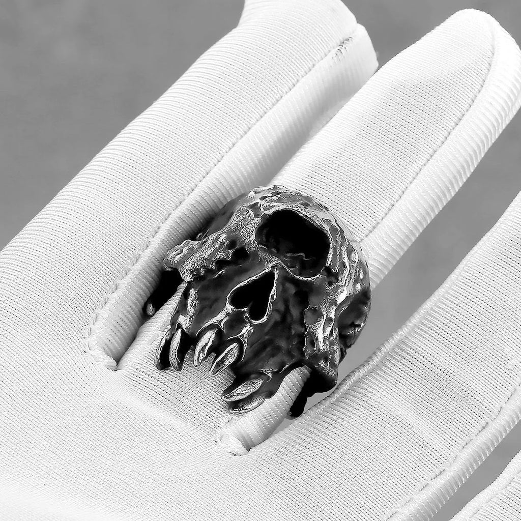 Alloy finger ring with a detailed one-eyed skull design in a retro punk style.