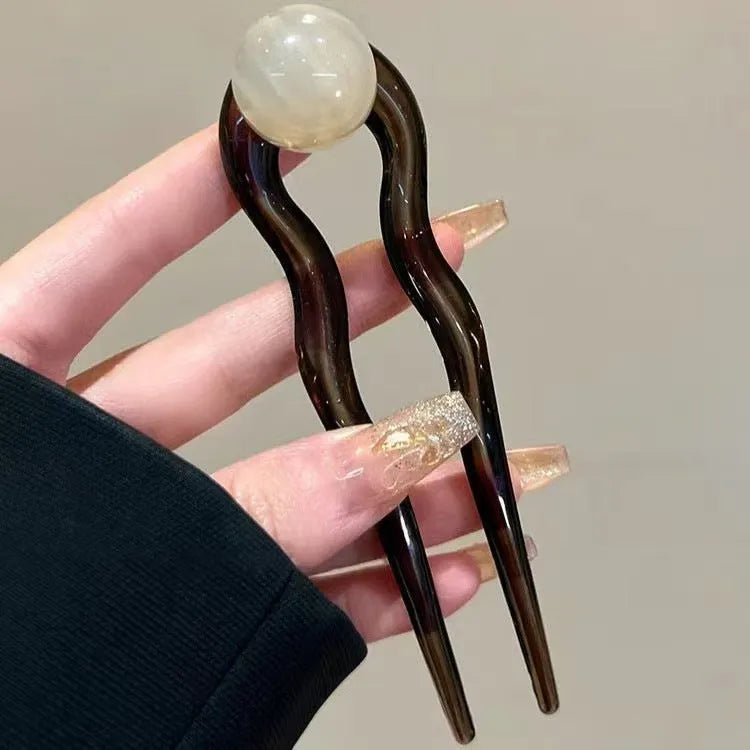 Simple U-shaped acrylic barrettes with ball retro design in beige, caramel, dark gray and green colours
