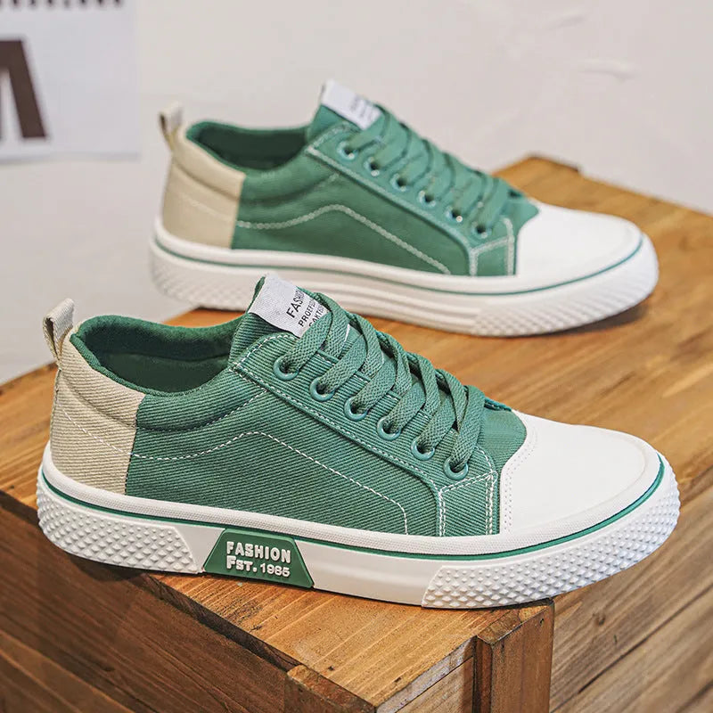 Men's blue canvas casual skateboarding shoes with round toe and lace-up front