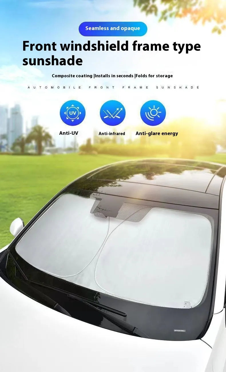 Titanium silver aluminium foil car windscreen sunshade unfolded on a dashboard.