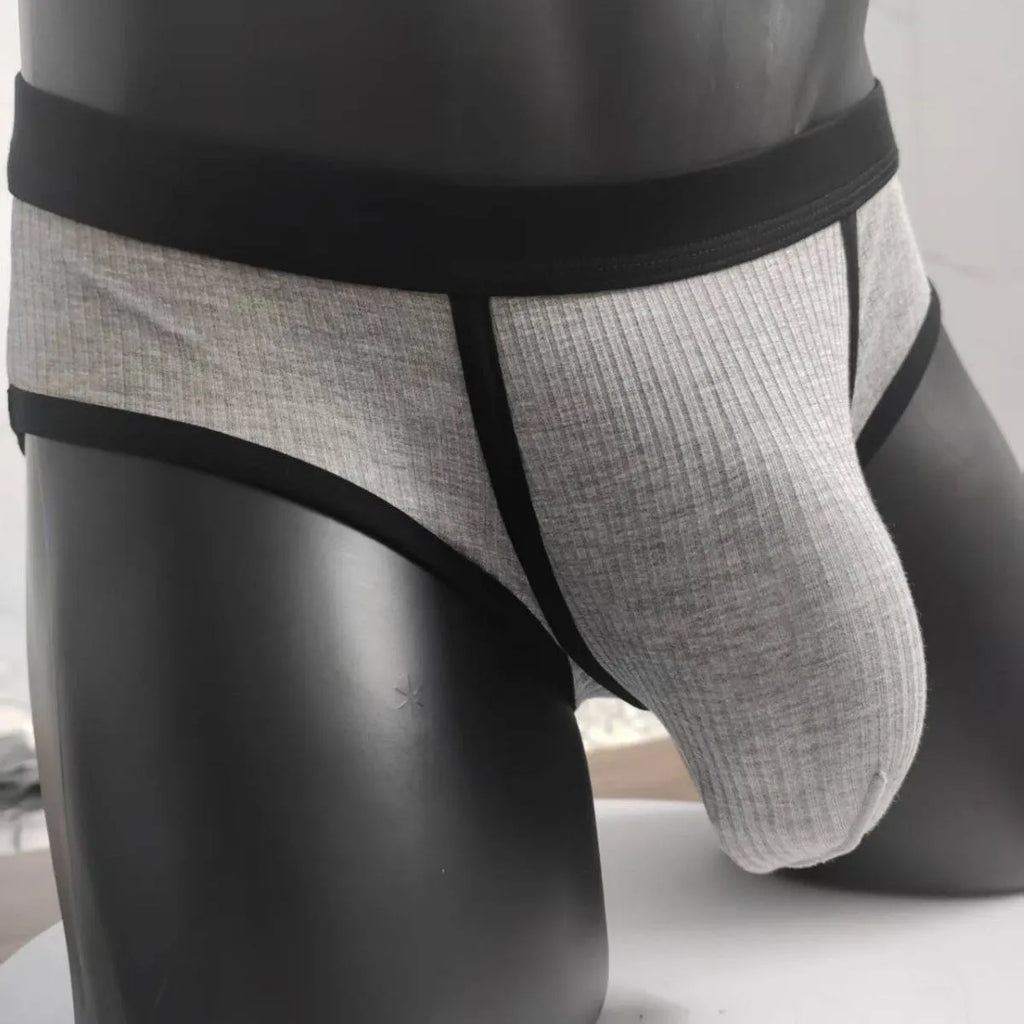 Men's black U-shaped underwear with triangle pouch design showing knitted viscose fabric texture