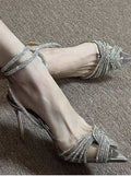Silver transparent cross rhinestone pointed high heels 8cm with slingback strap on display