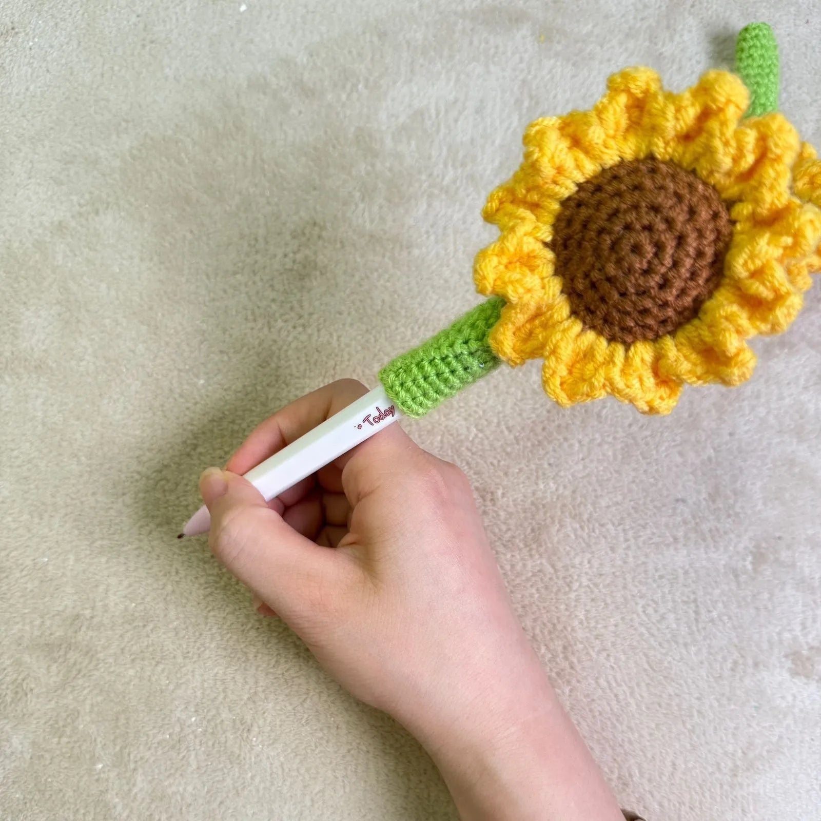 Hand-woven sunflower design pen cover in natural fabric for teacher gifts