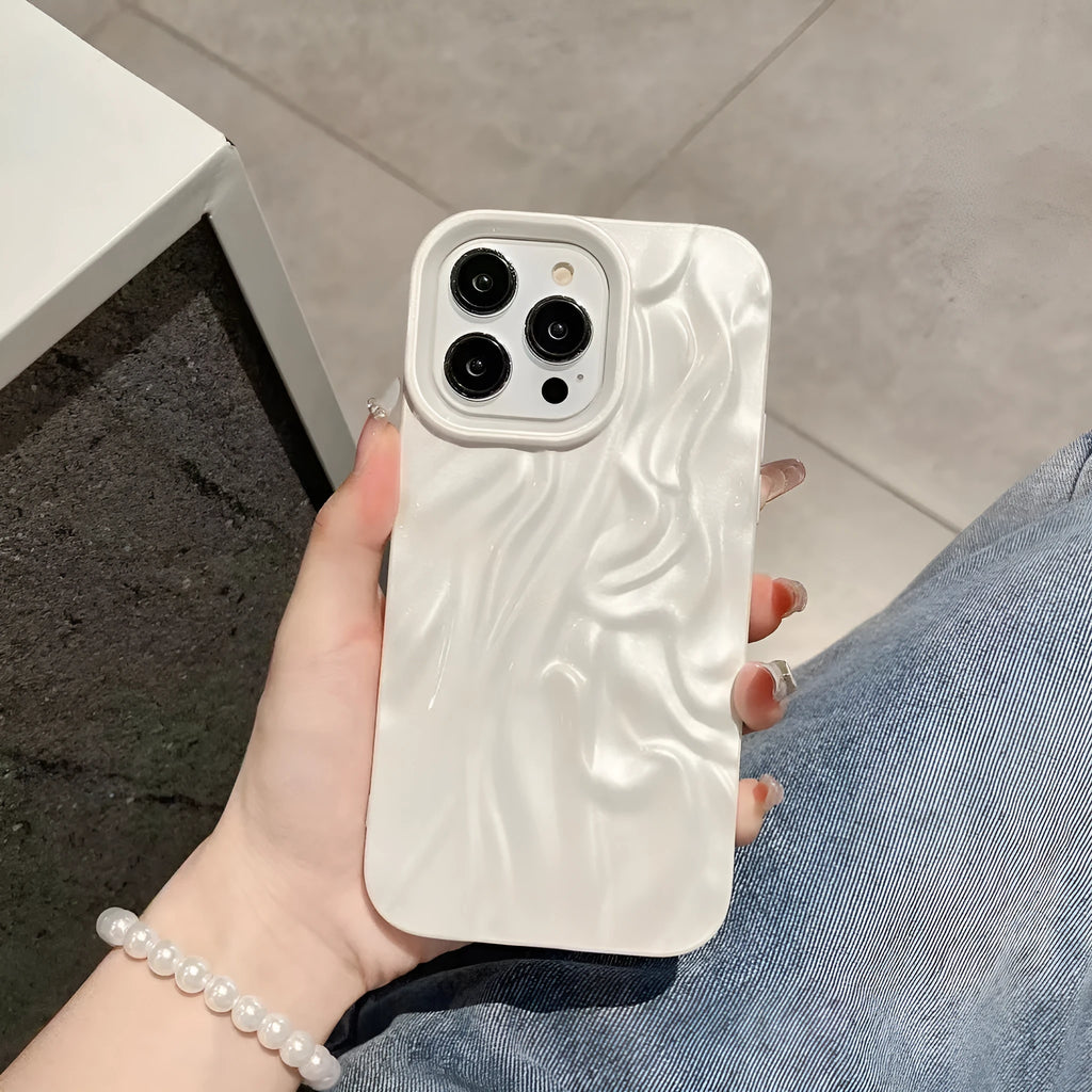 Ins style solid colour water ripple silicone phone case for iPhone models on a plain background.