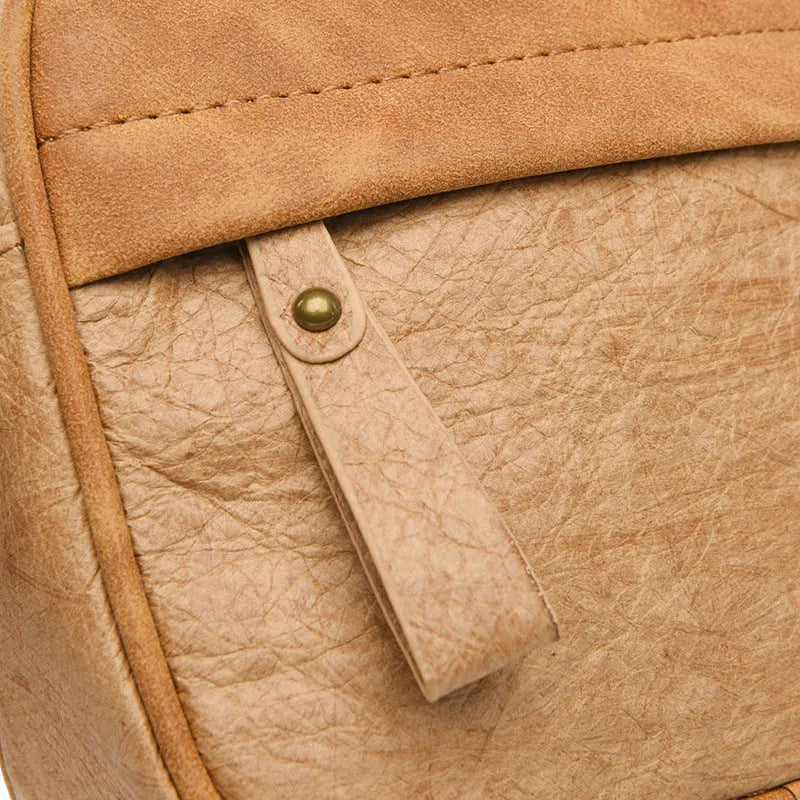 Men's retro-style crossbody bag made from paper material in a choice of colours.