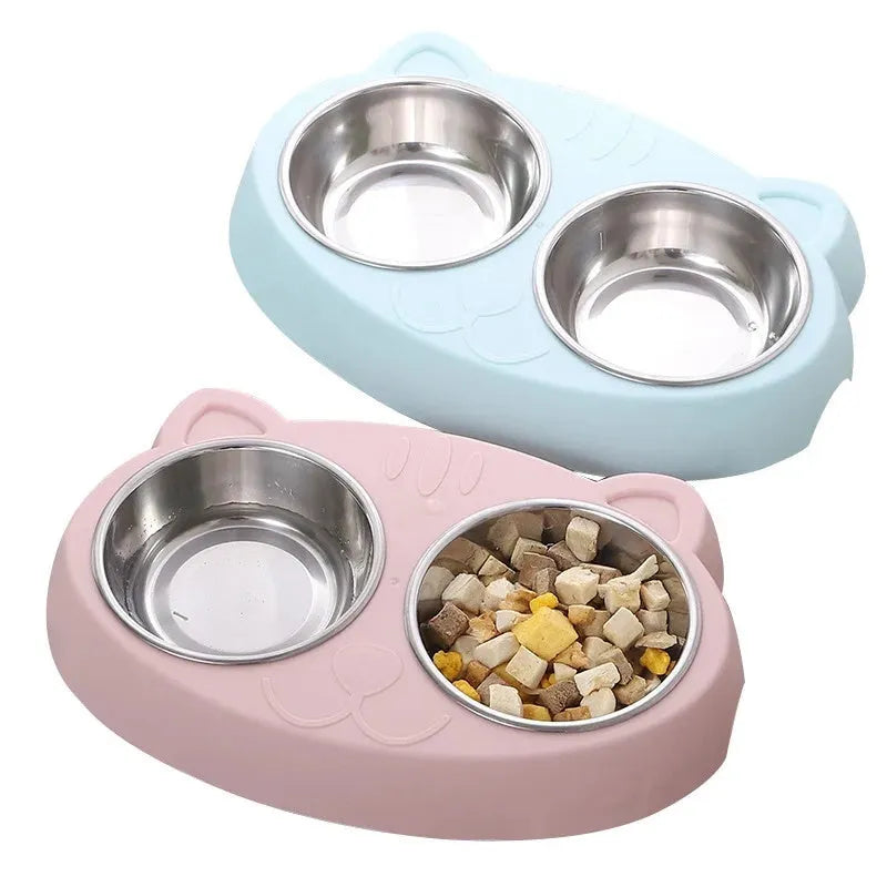 Blue macaron-shaped plastic pet feeder tray with two bowls for cat or dog food and water.