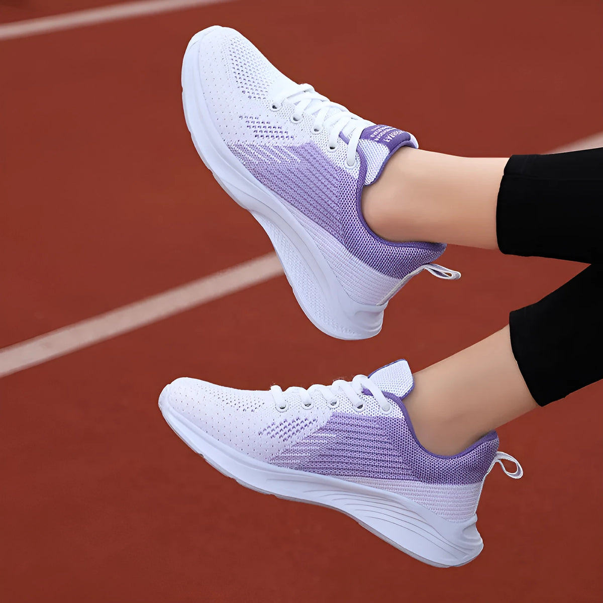 Women's mesh leisure sneakers with T-shaped bandage design, round toe, in white and black colourway