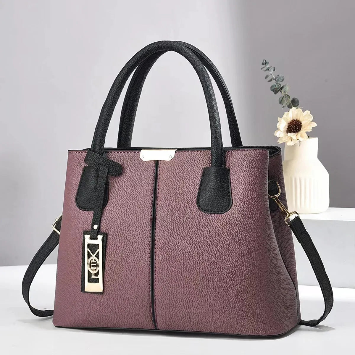 Women's large capacity shoulder bag in soft PU leather with adjustable strap and multiple colour options