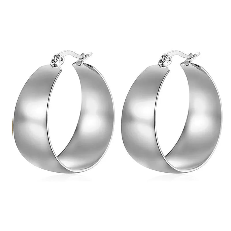Stainless steel curved earrings with electroplated gold or steel finish in 25mm or 30mm sizes