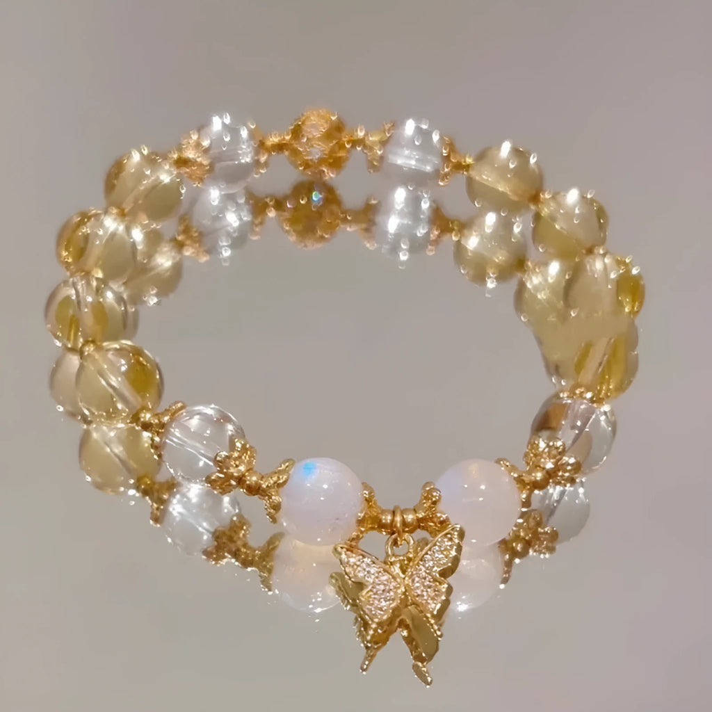 Moonstone white crystal bracelet with citrine butterfly motif and elastic closure