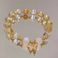 Moonstone white crystal bracelet with citrine butterfly motif and elastic closure