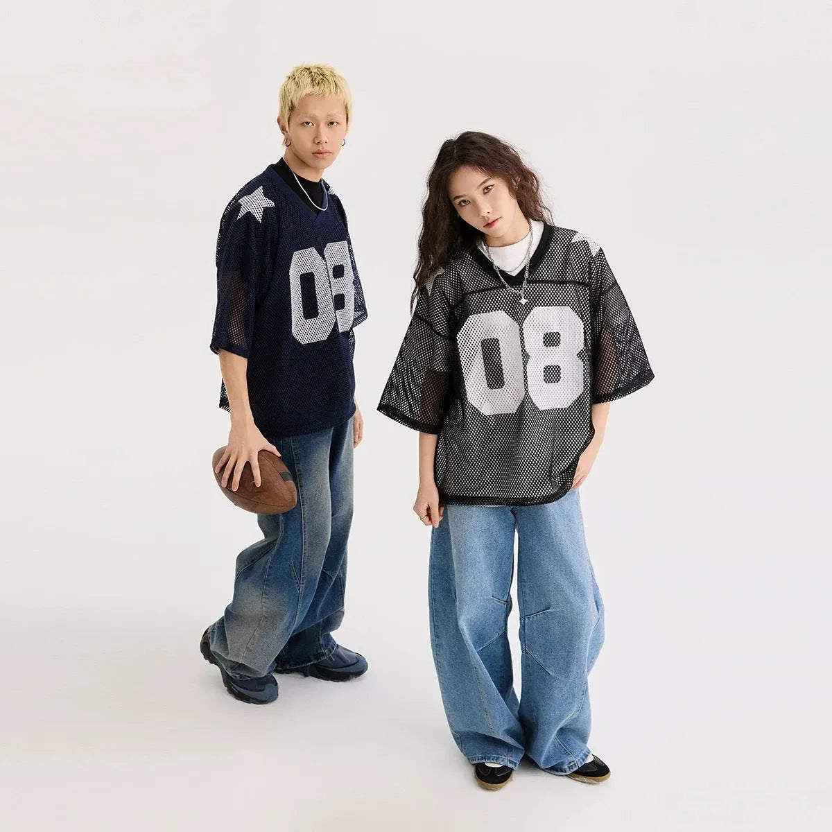 Black half sleeve shirt with white letter pattern, loose fit pullover style for men and women