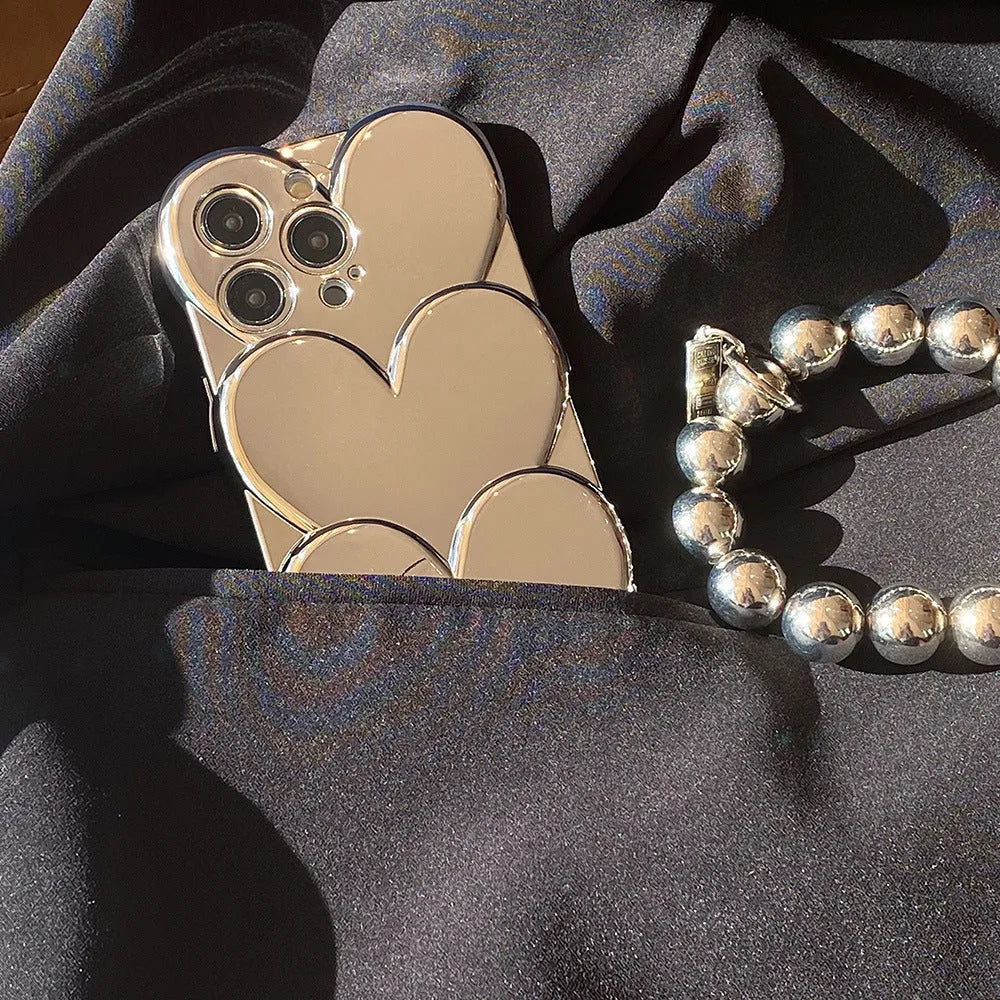 Electroplated love design TPU soft shell mobile phone case for iPhone, shown with optional matching bracelet.