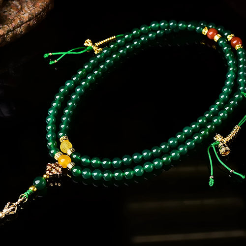 Handmade multi-strand bracelet made with round green agate beads from Brazil