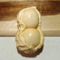 Natural solid bamboo peanut ornament with 'May Good Things Happen' engraved message.