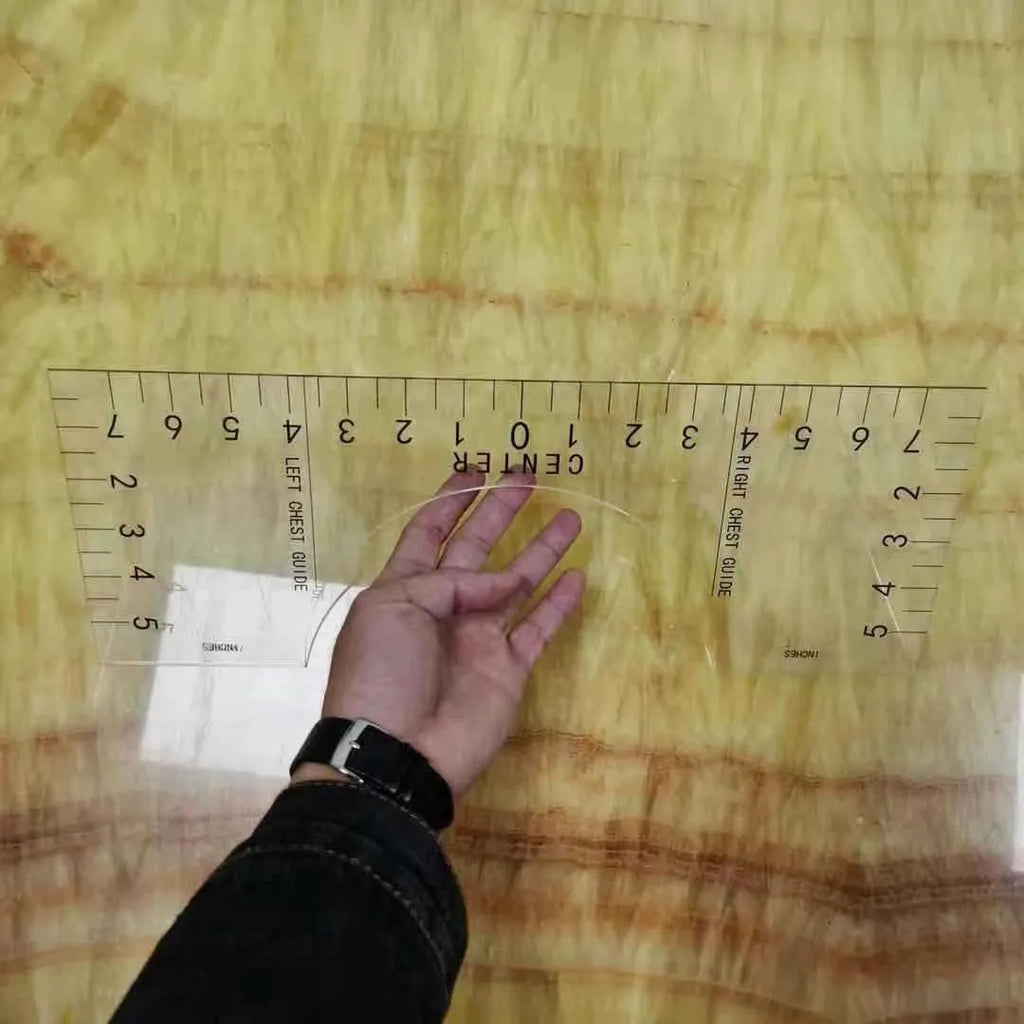 Transparent acrylic sewing patch ruler measuring 10x6 inches for T-shirt alignment and garment construction