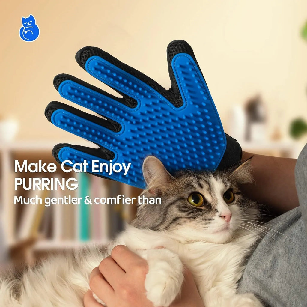 Blue pet grooming glove with silicone tips for brushing dogs and cats.