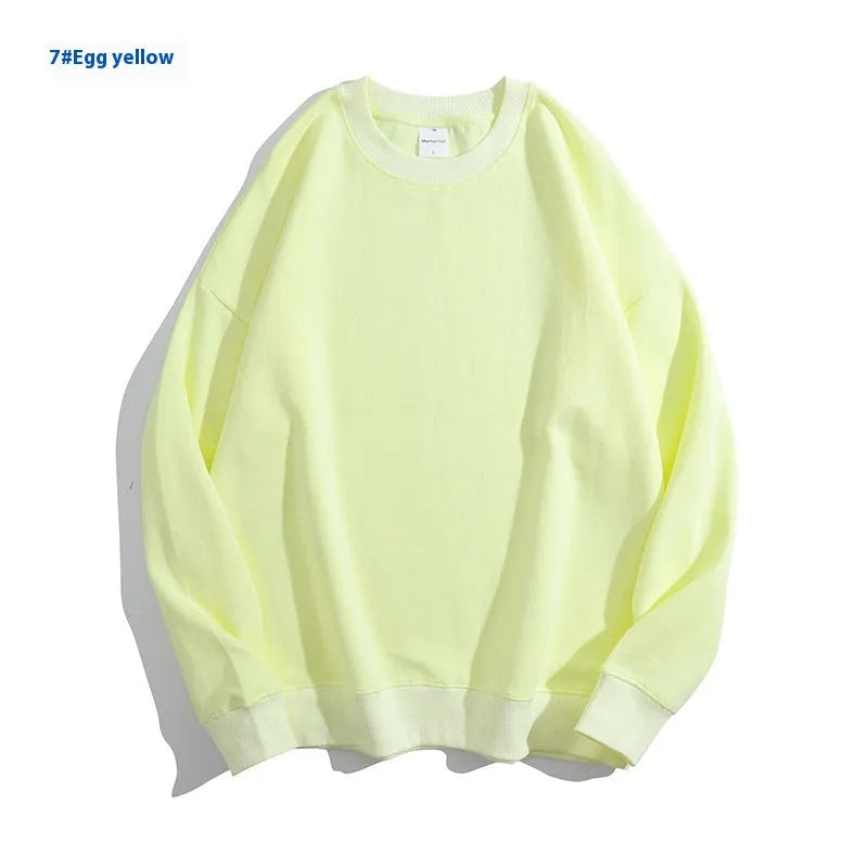 Cotton off shoulder pullover sweater in a loose fit, shown in a solid colour with long sleeves.