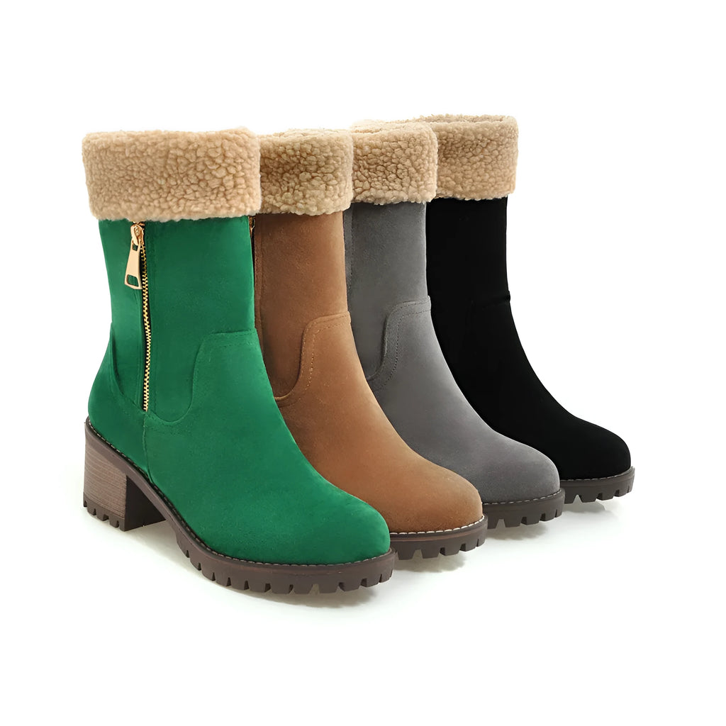 A pair of snow boots in black, grey, green, or orange with a rubber sole and plush lining.