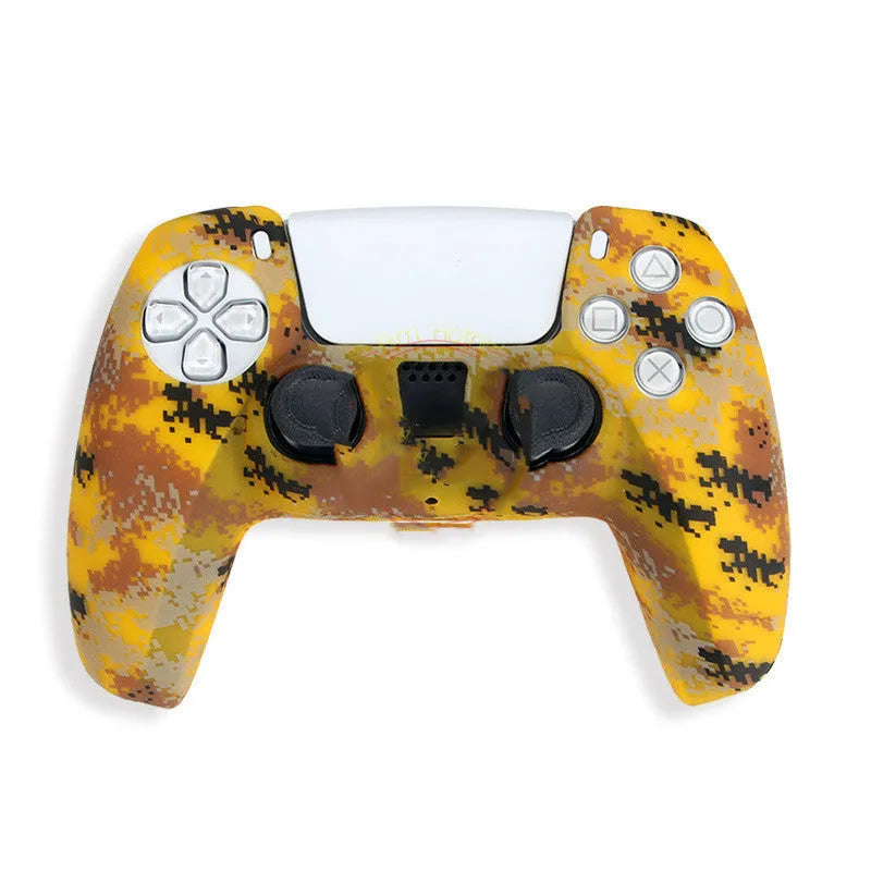 Camouflage patterned silicone grip case fitted on a black Sony PS5 DualSense controller.