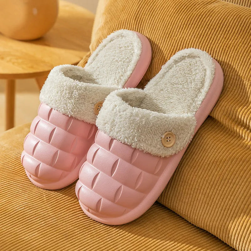 Plaid detachable slippers for women with plush lining and EVA sole in pink, shown on a wooden floor.