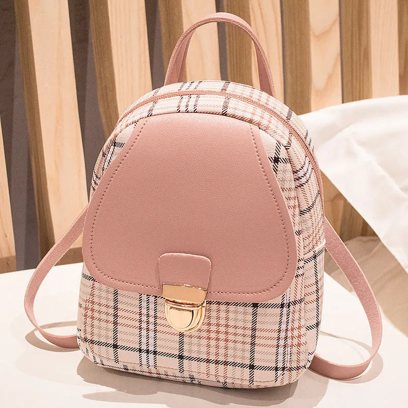 A diagonal one shoulder phone bag in synthetic PU leather, shown in a colour selection.