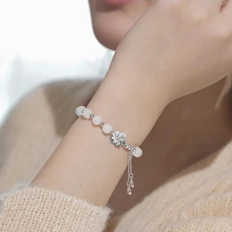 New Chinese style beaded bracelet with floral resin design in matching couple colour options