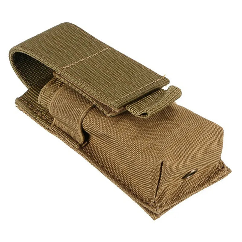 Black tactical MOLLE pouch with elastic cord closure for pistol cartridges or a small flashlight.