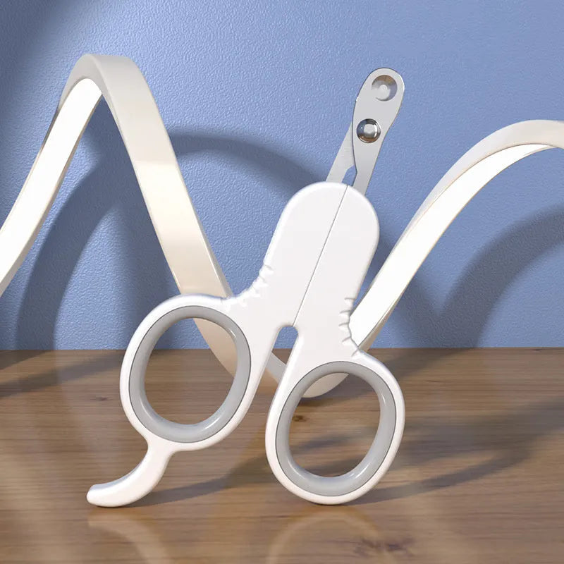 Professional pet nail clippers with curved tips and rubber-coated handles for cats and small dogs