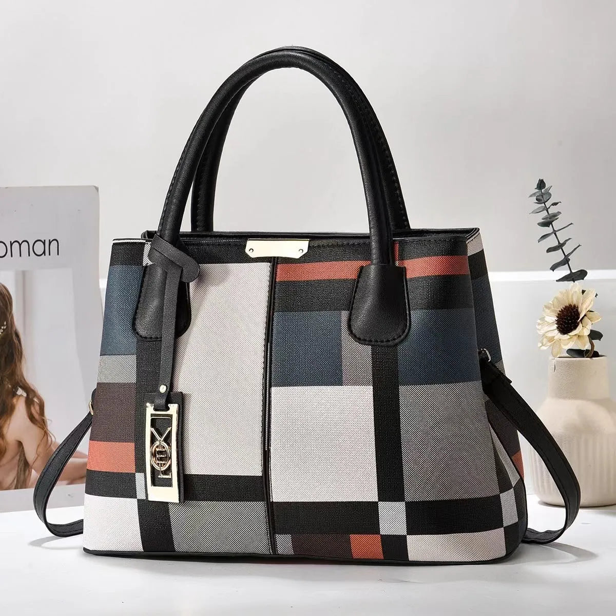 Women's large capacity shoulder bag in soft PU leather with adjustable strap and multiple colour options