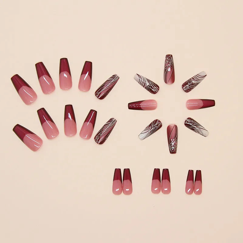 French line patterned removable nail sticker patches and glue tube on white background.
