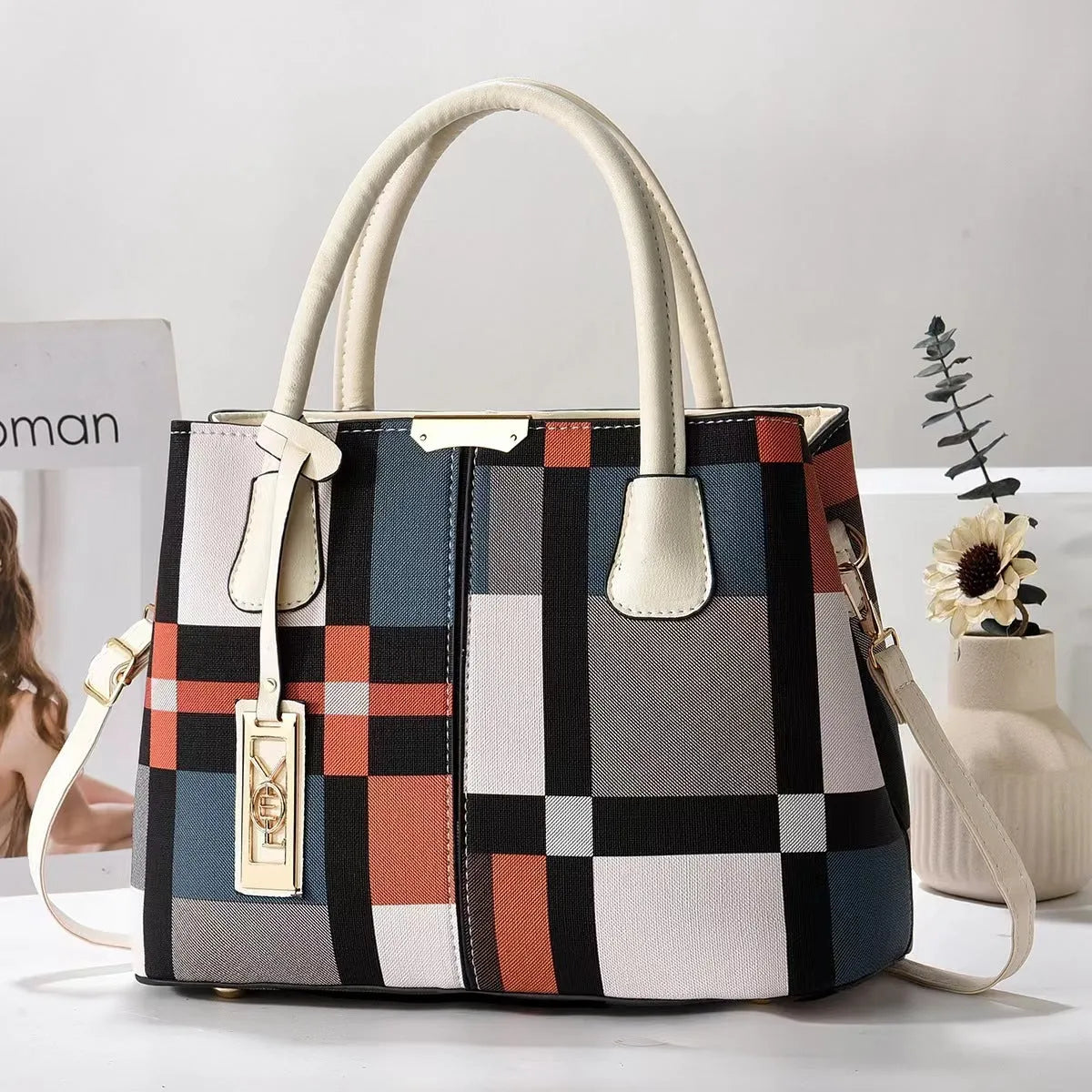 Women's large capacity shoulder bag in soft PU leather with adjustable strap and multiple colour options
