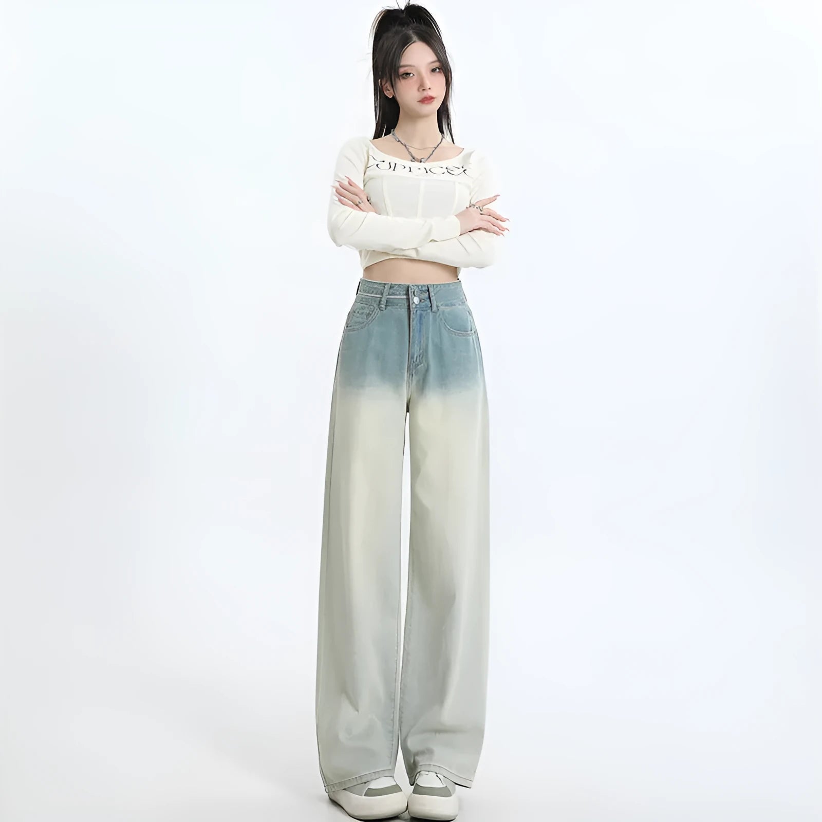 Women's gradient blue straight-leg denim trousers with wide leg style on hanger