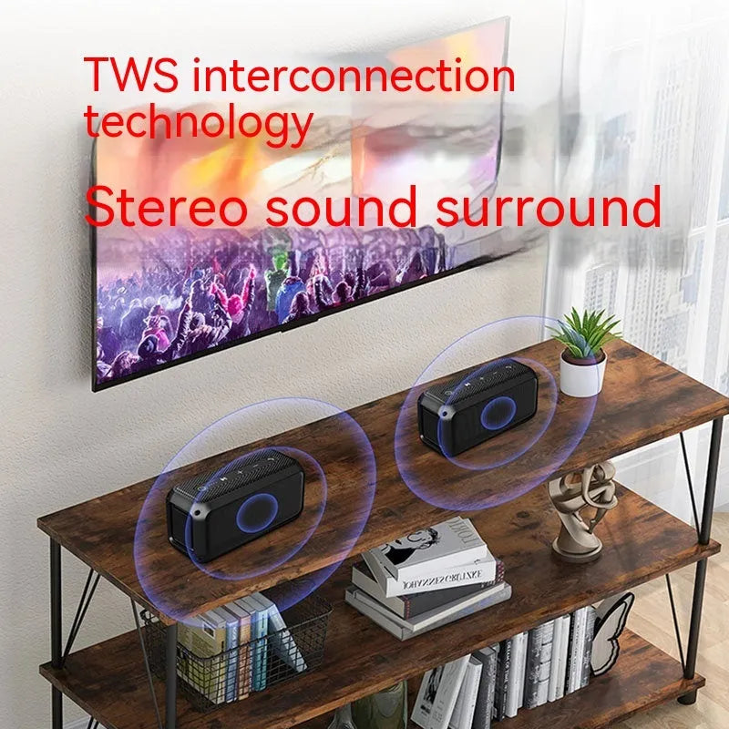 Black plastic portable Bluetooth speaker with subwoofer and 4000mAh battery for outdoor and home use