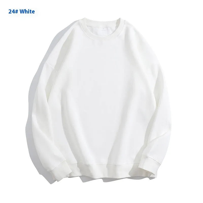Cotton off shoulder pullover sweater in a loose fit, shown in a solid colour with long sleeves.