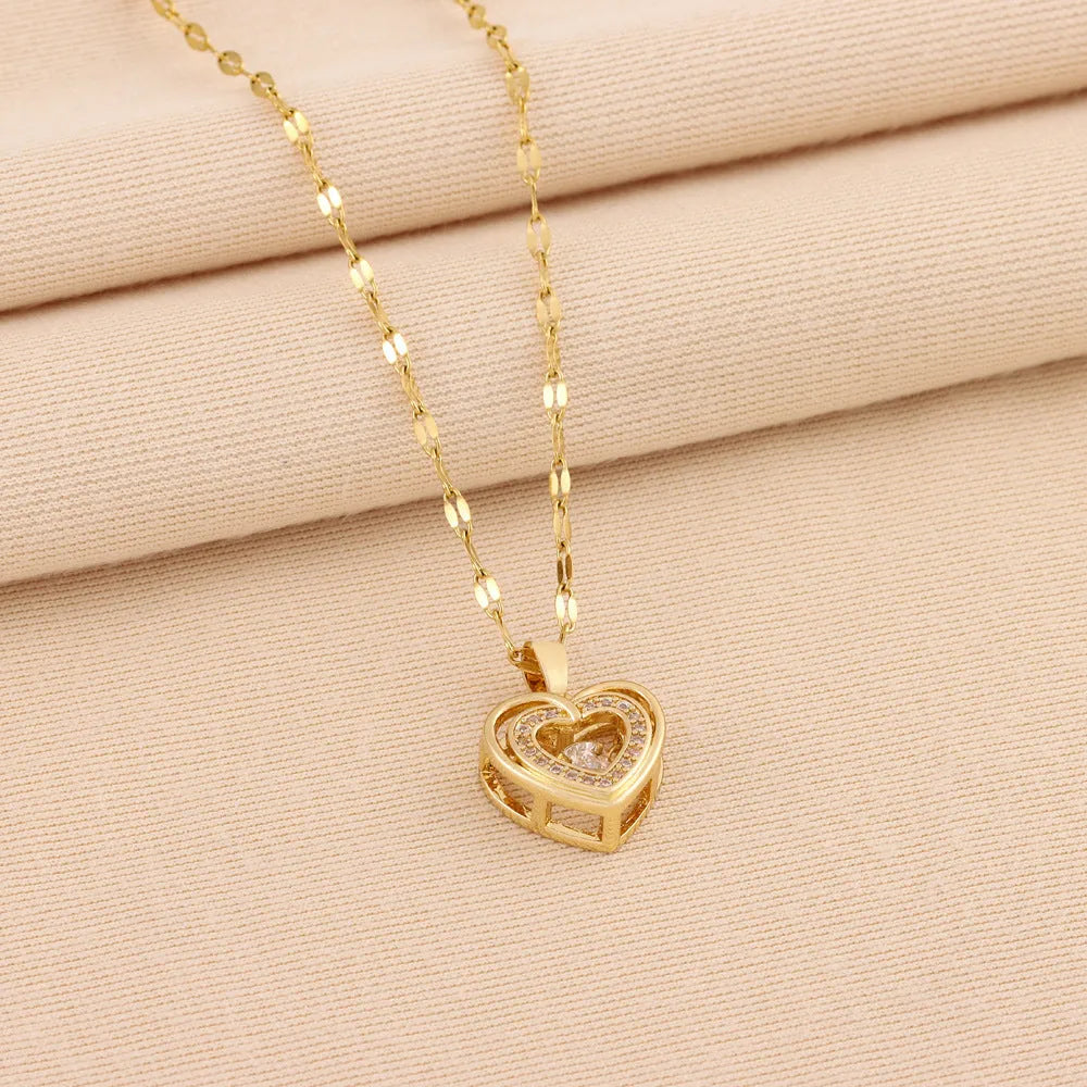 Double-layer titanium steel love necklace with rhinestone heart pendant on woman