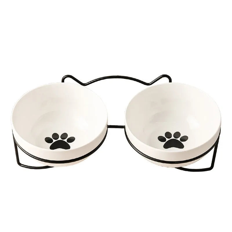 White ceramic cat bowl with decorative iron frame in cat ear design
