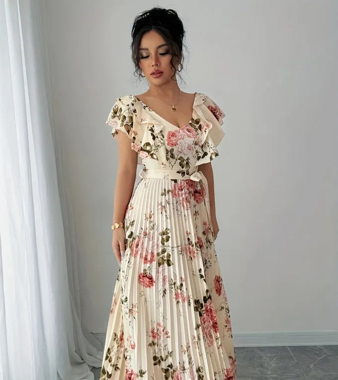 Apricot floral print women's dress with V-neck, ruffle sleeves, and a high-waisted swing skirt.