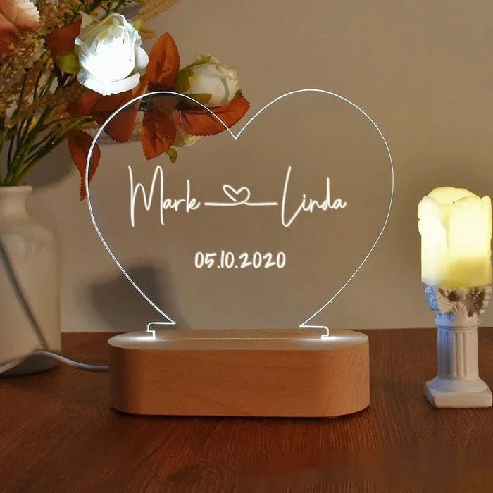 Personalised acrylic night light displaying custom text with USB cable, dimensions 20cm by 11.5cm