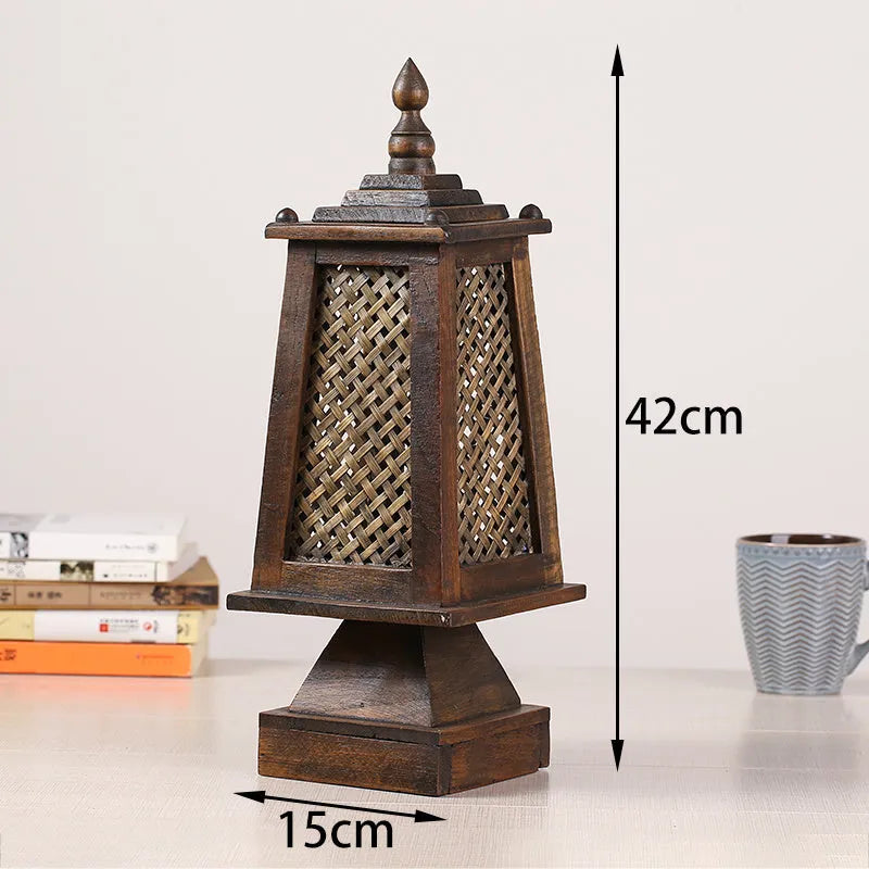 Retro wooden table lamp with hand-woven straw rattan lampshade on bedside table