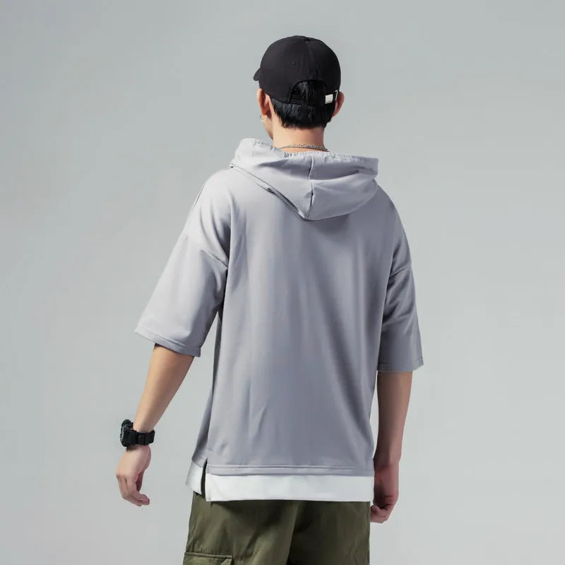 Solid colour loose fit hooded men's short-sleeved T-shirt in black with 3/4 sleeves
