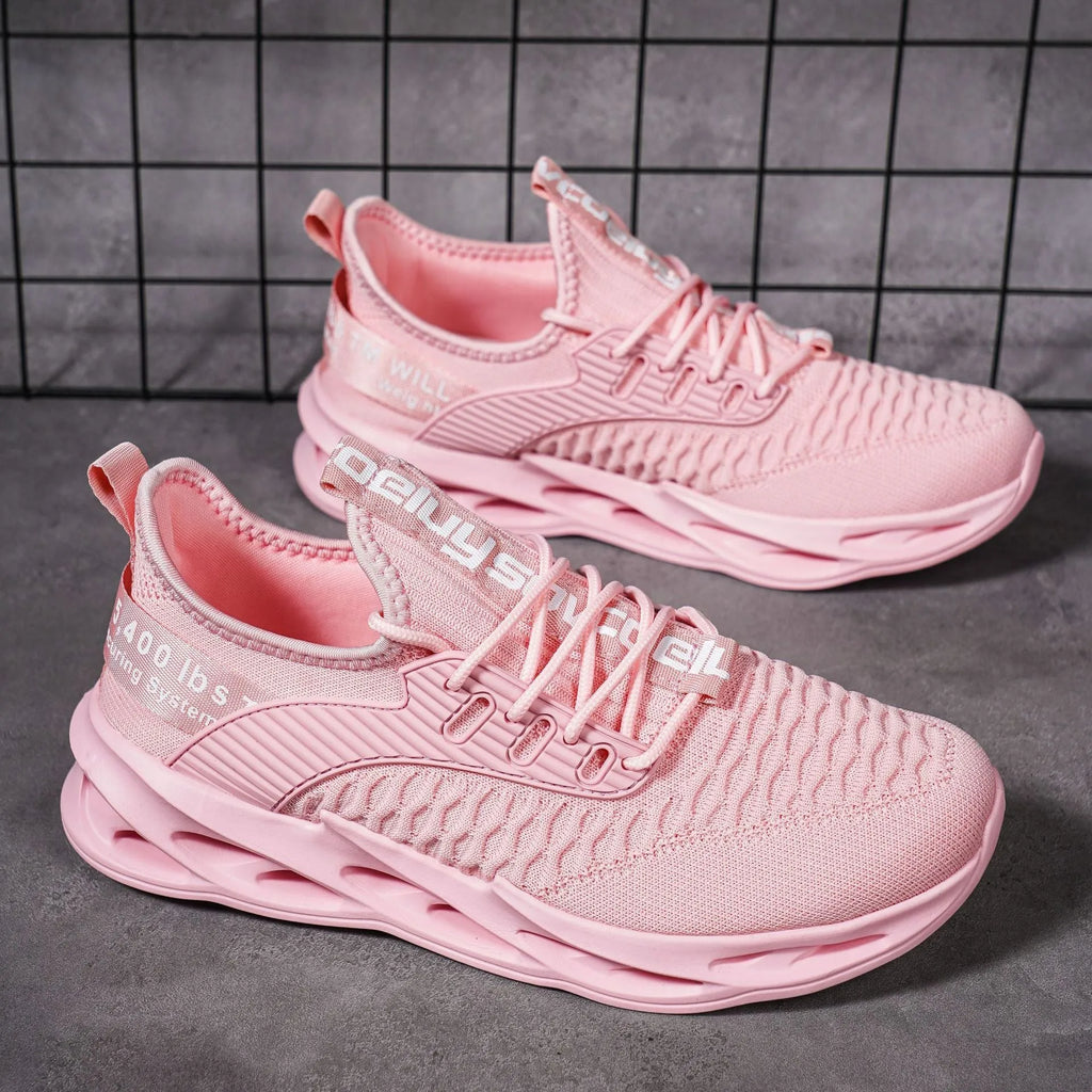 Women's FlyKnit casual shoe in a solid colour with mesh upper and round toe.