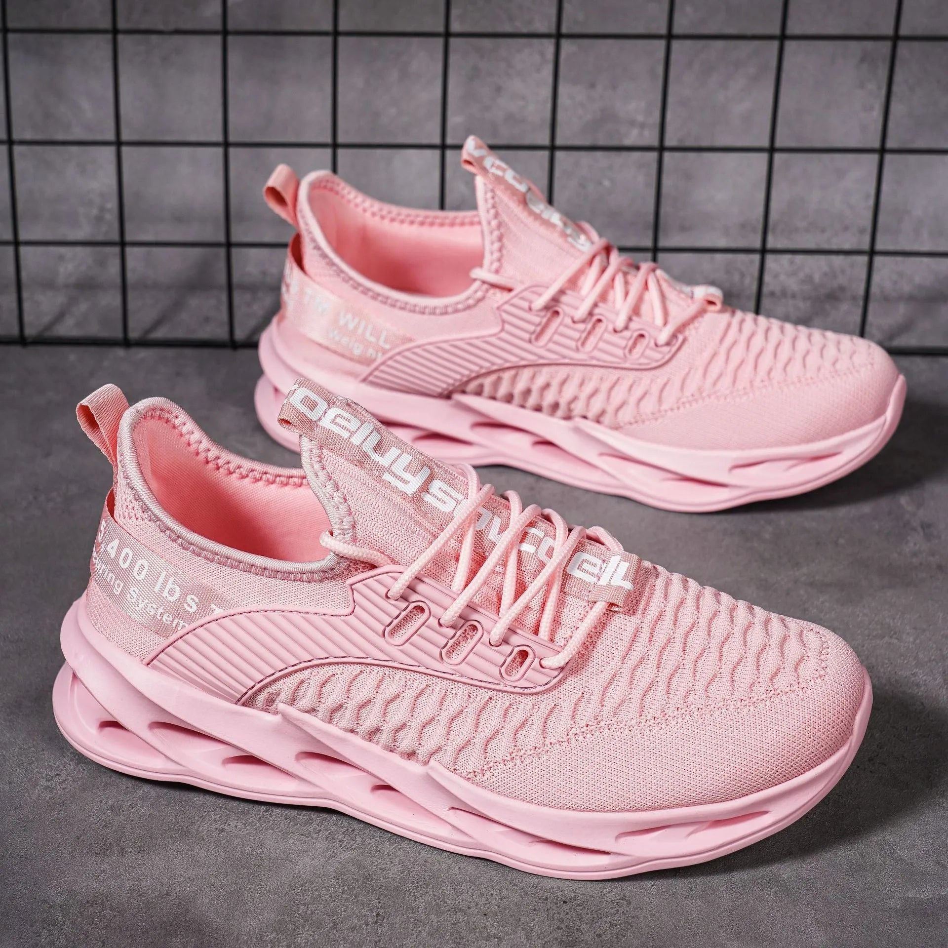 Women's FlyKnit casual shoe in a solid colour with mesh upper and round toe.
