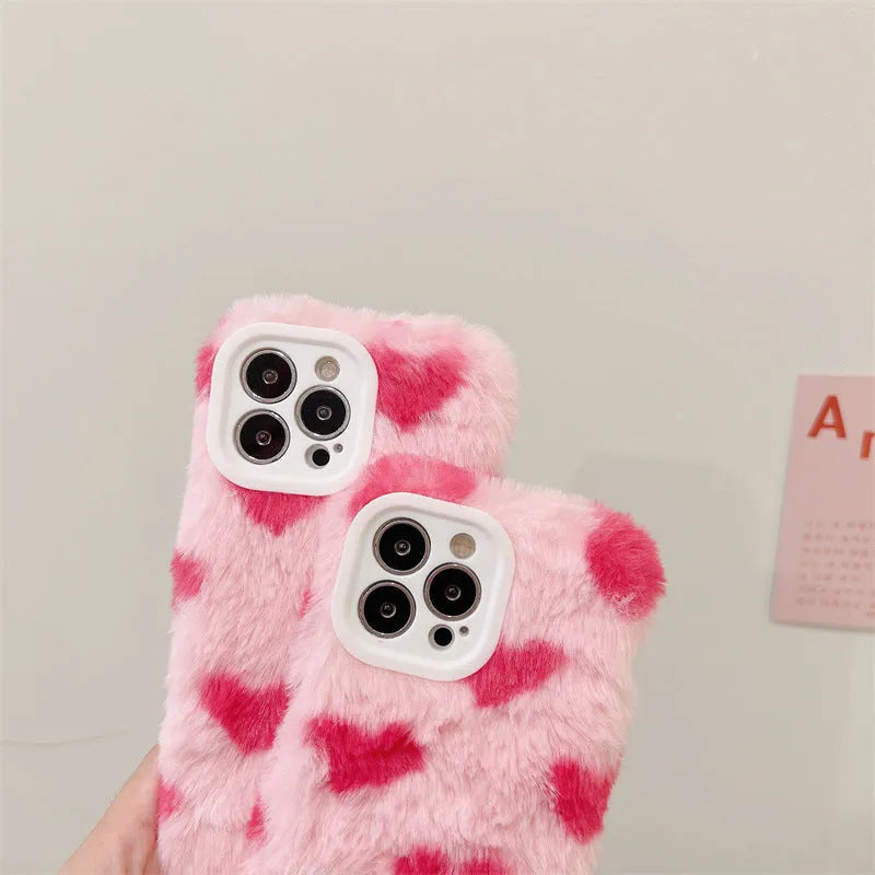 Pink silicone iPhone case with Love Plush cartoon design, shown as a back cover.
