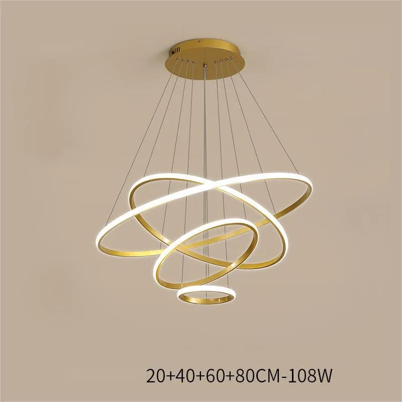 Gold smart LED chandelier with aluminium alloy build and tiered shades over a dining table