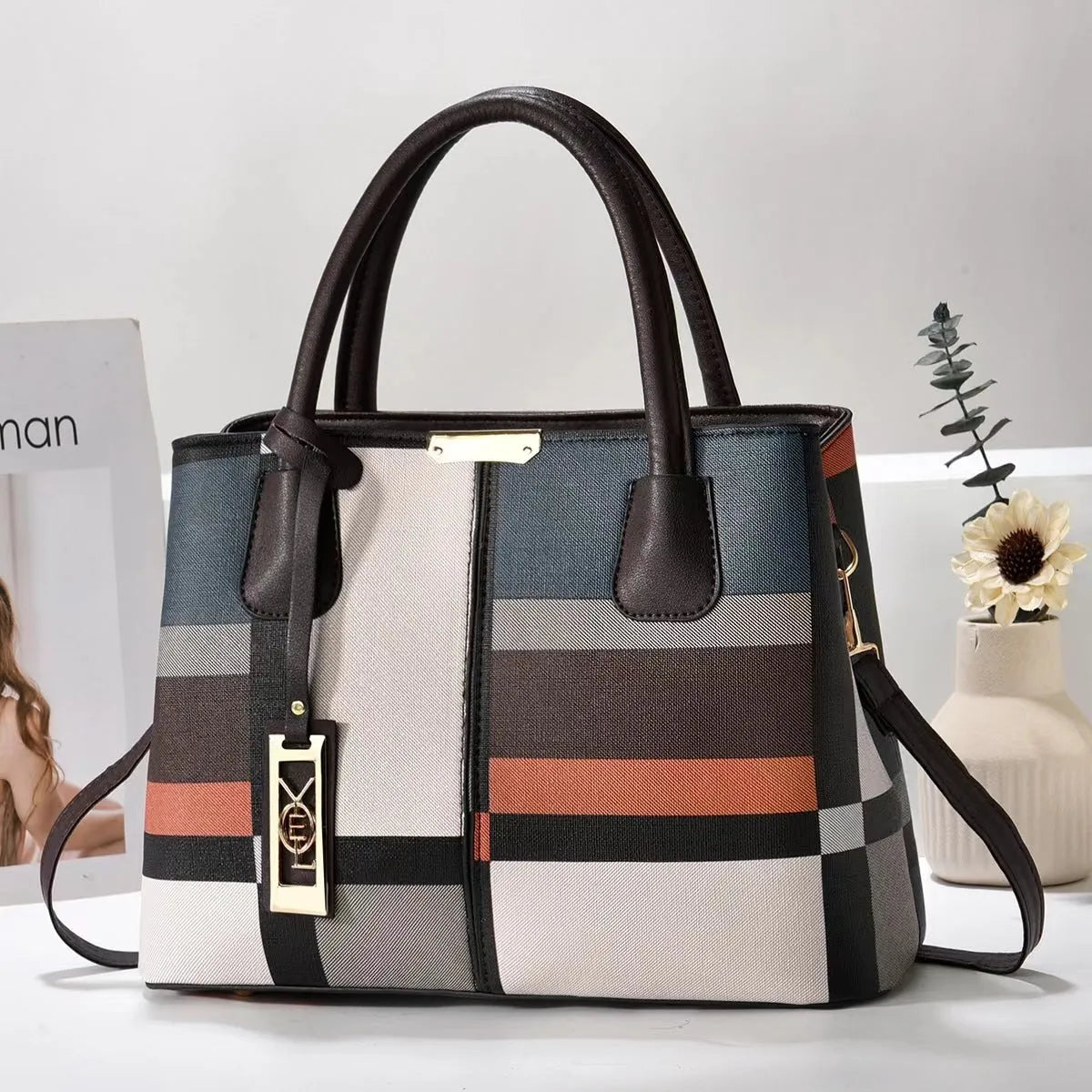 Women's large capacity shoulder bag in soft PU leather with adjustable strap and multiple colour options