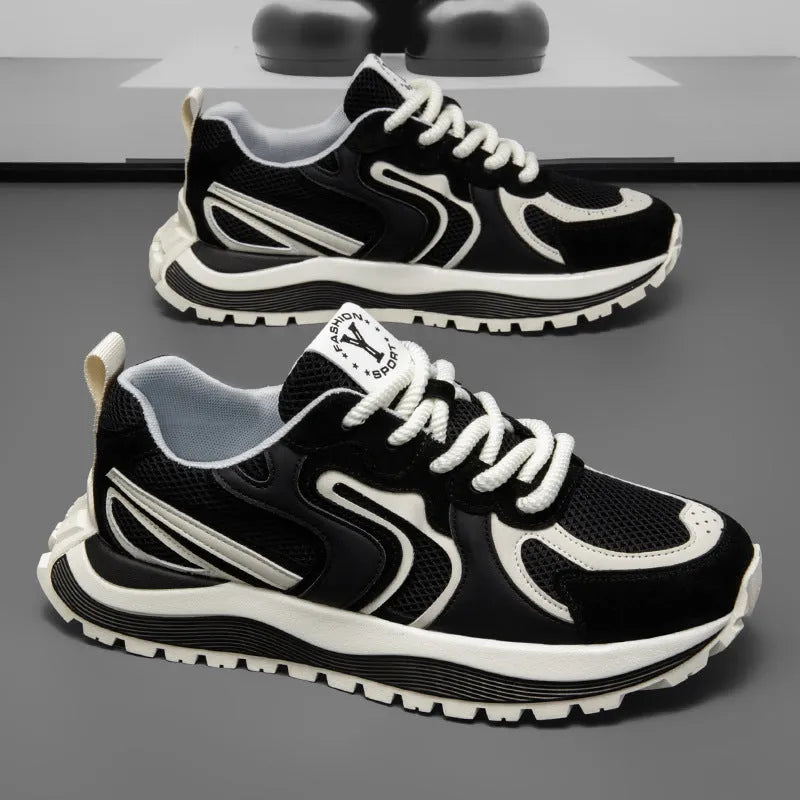 Men's yellow synthetic leather and mesh casual sneaker with rubber sole and lace-up front.