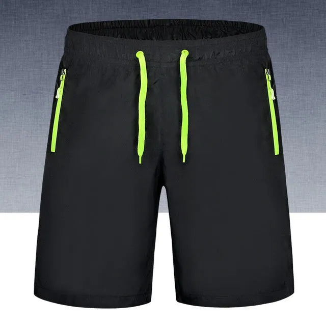Quick-drying breathable gym running pants in fluorescent green – 100% polyester thin fabric with micro-elasticity, side view on treadmill