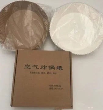 Pack of 50 round white disposable paper liners for air fryers and ovens